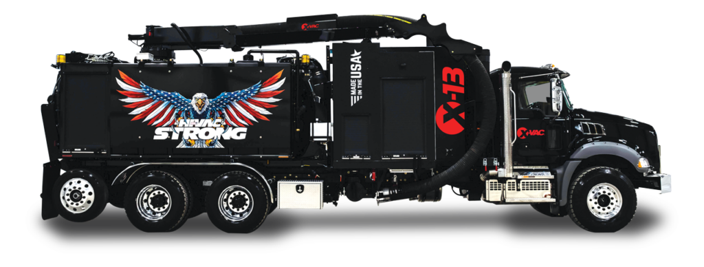 Black X-Vac hydro excavation truck with large vacuum hose, patriotic eagle mural and Made in the USA X-13 branding