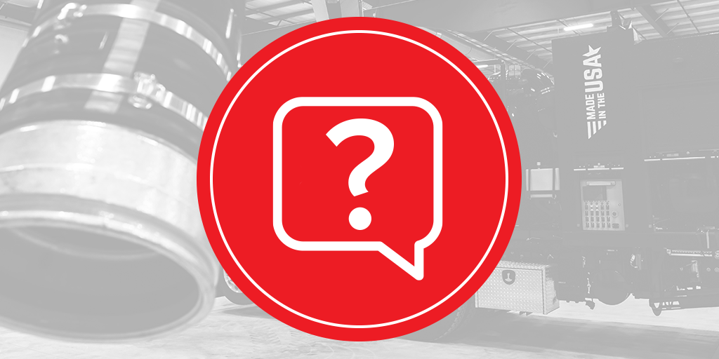 Red question-mark icon over grayscale X-Vac hydro excavation truck in shop, showing vacuum system and Made in the USA.
